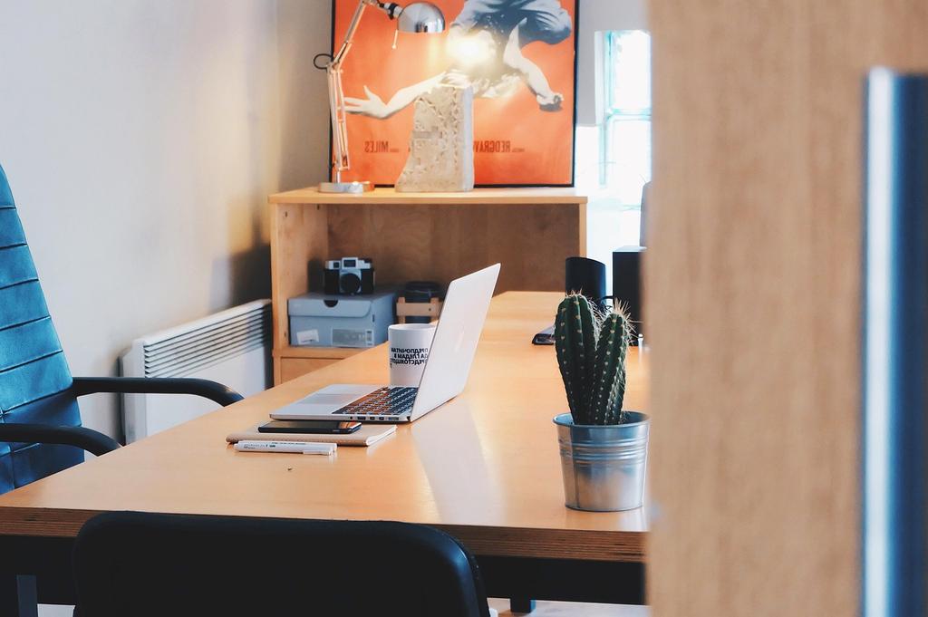 Ergonomic desk setup with adjustable chair, monitor, and accessories